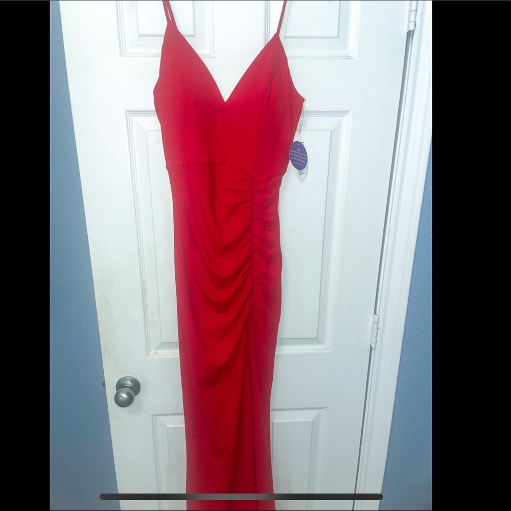 Brand new red dress with slit